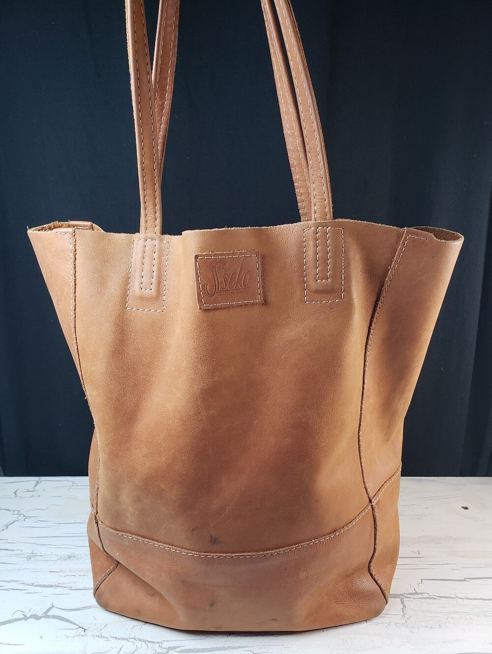 Sseko Designs Safari Leather bucket bag in Oil Tan Camel Shade